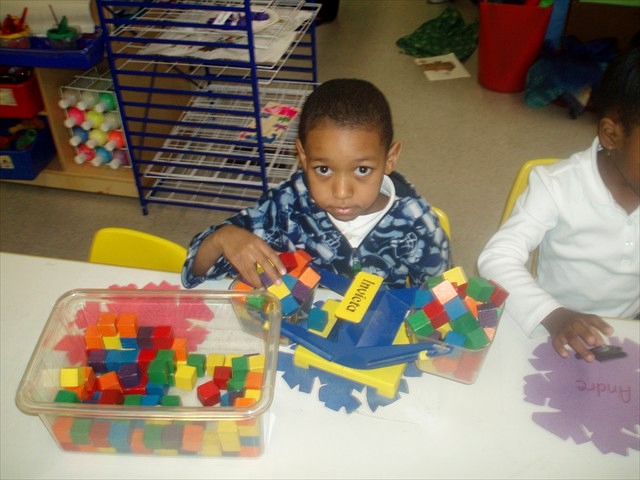 Toddlers playing and learning together at Bright Kids Academy daycare